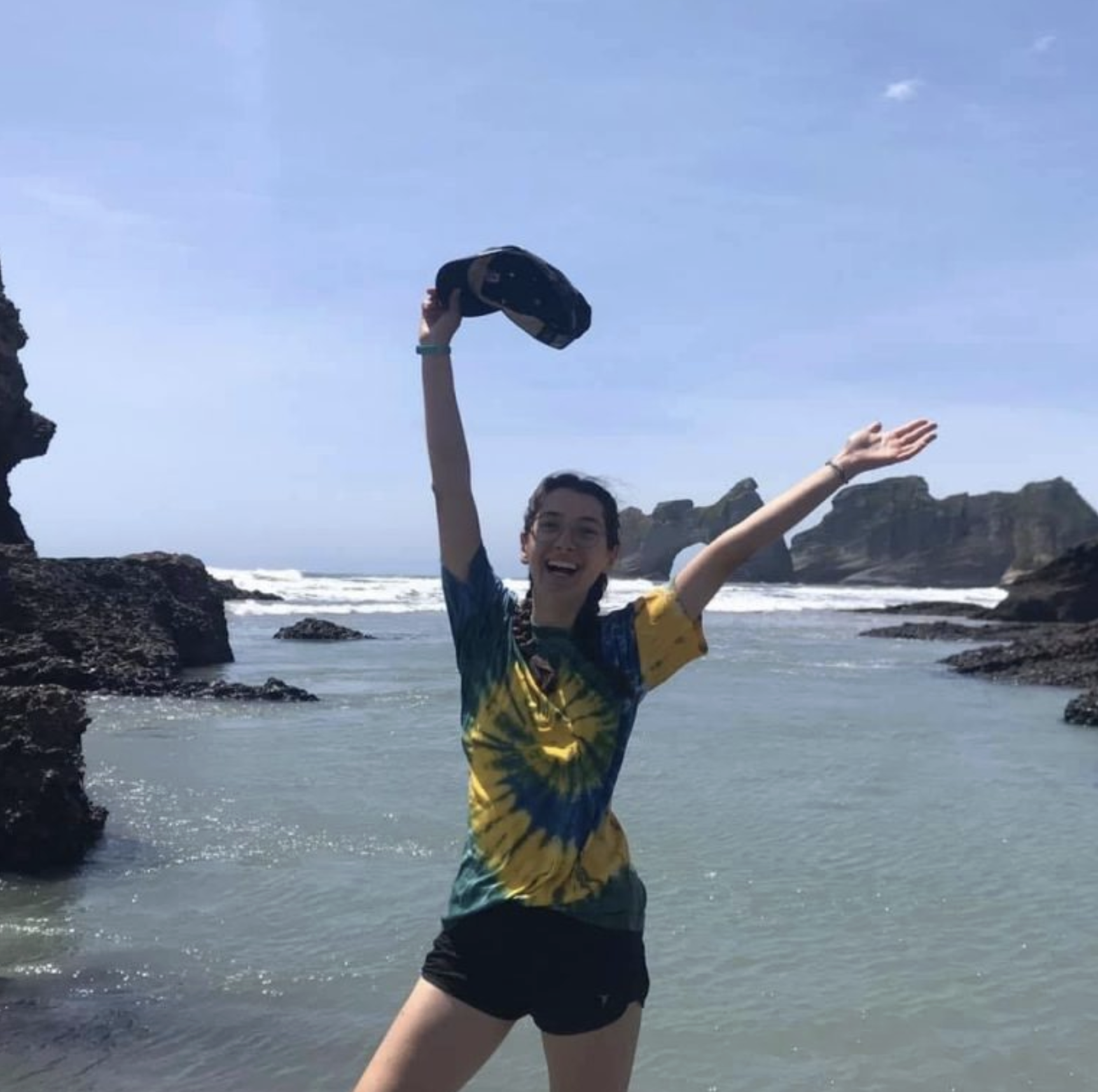 ElyseKelsey_Beach Elyse standing on Wharariki Beach in New Zealand<br />